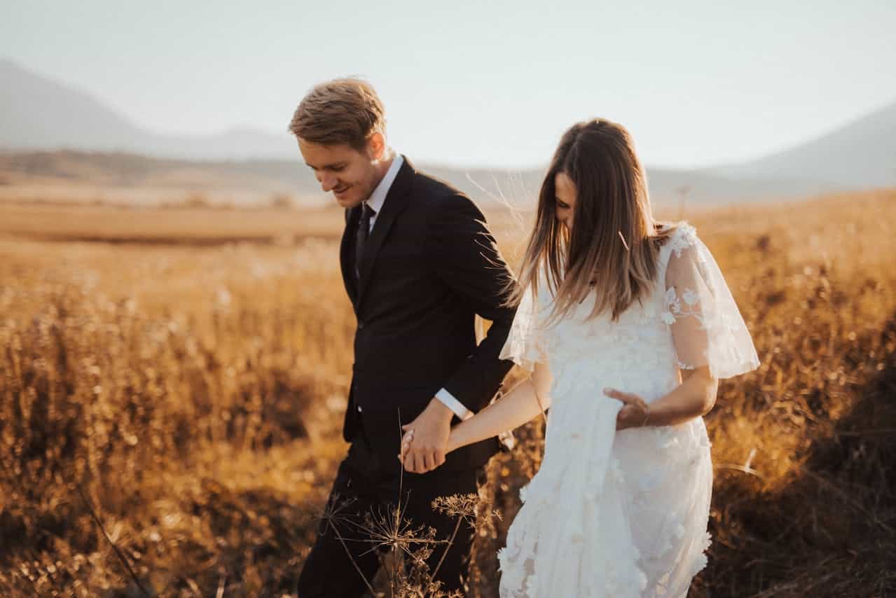 Husband and wife holding hands